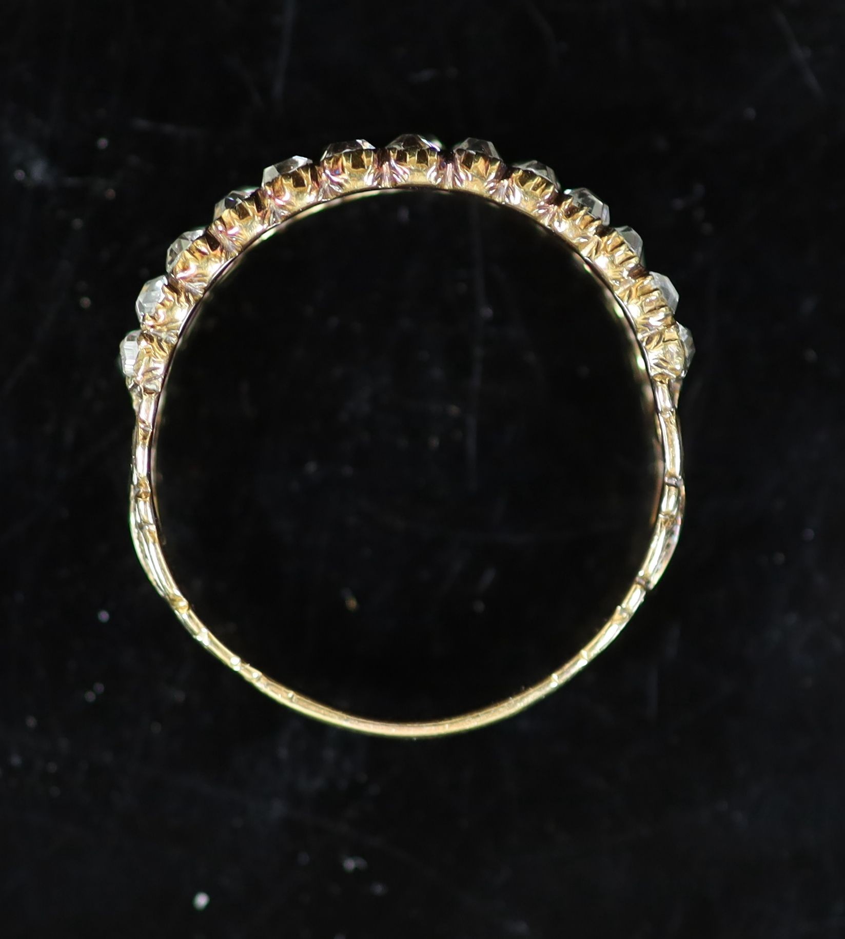 A 19th century gold and twin row old mine cut diamond set half hoop ring